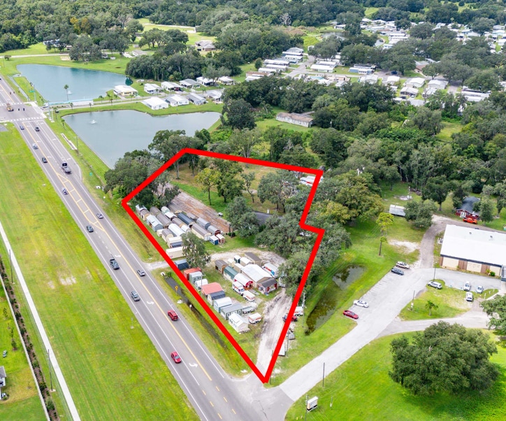 Original aerial photograph of 3161 Gall Boulevard with property boundary outlined